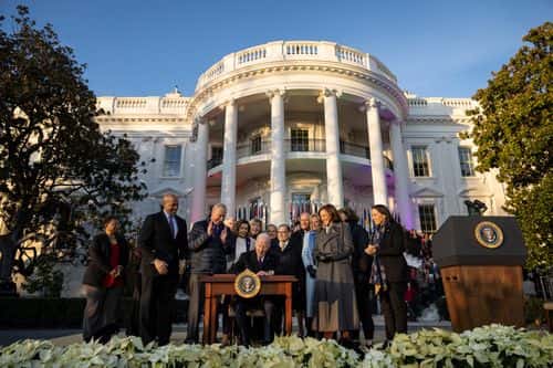 U.S. President Joe Biden signs the Respect for Marriage Act on the South Lawn of the White House December 13, 2022 in Washington, DC. The Respect for Marriage Act will codify same-sex and interracial marriages. (Photo by Drew Angerer/Getty Images)