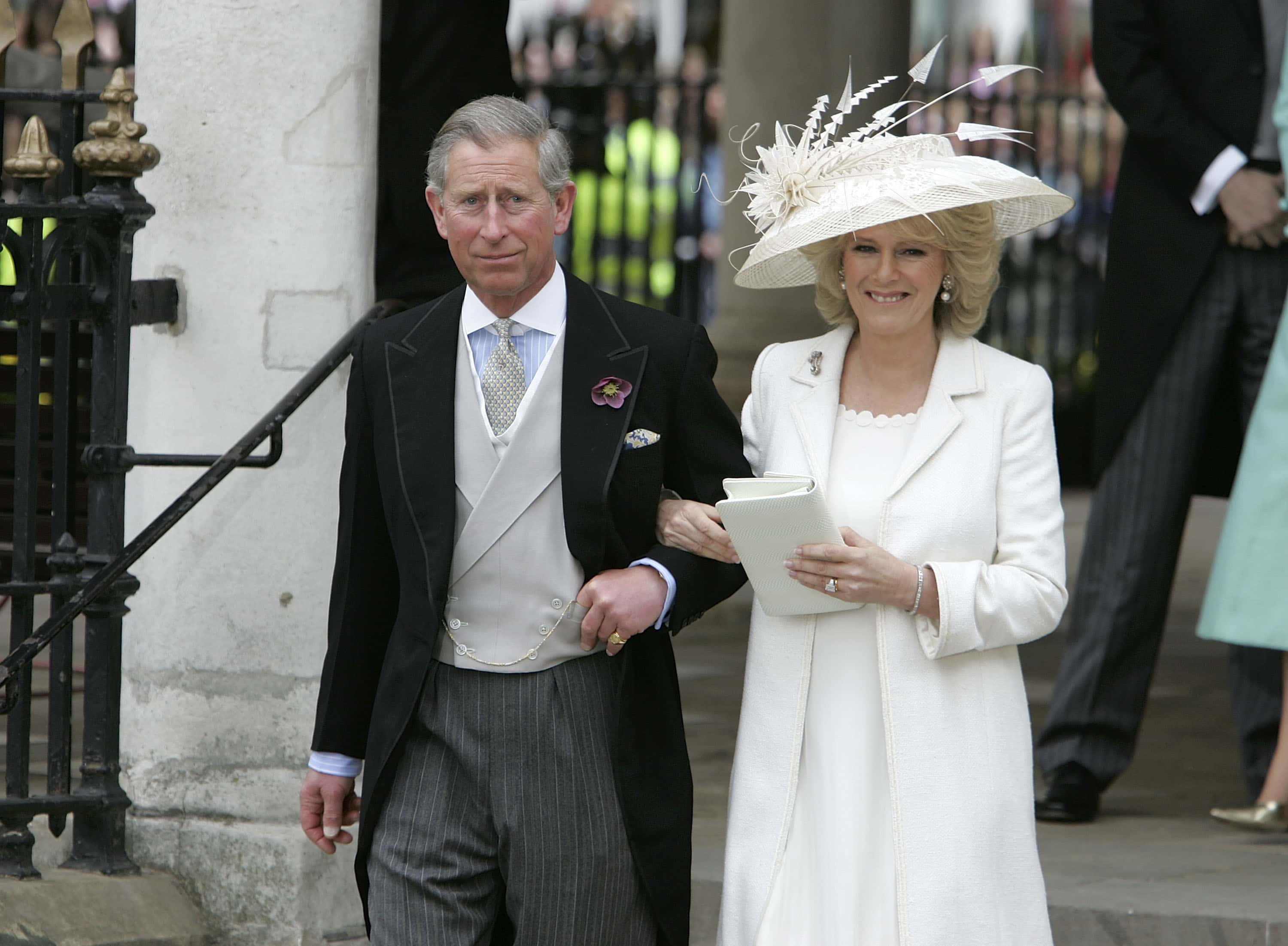 TRH Prince Charles, the Prince of Wales, and his wife Camilla, the Duchess of Cornwall, depart the Civil Ceremony where they were legally married, at The Guildhall, Windsor on April 9, 2005 in Berkshire, England.
