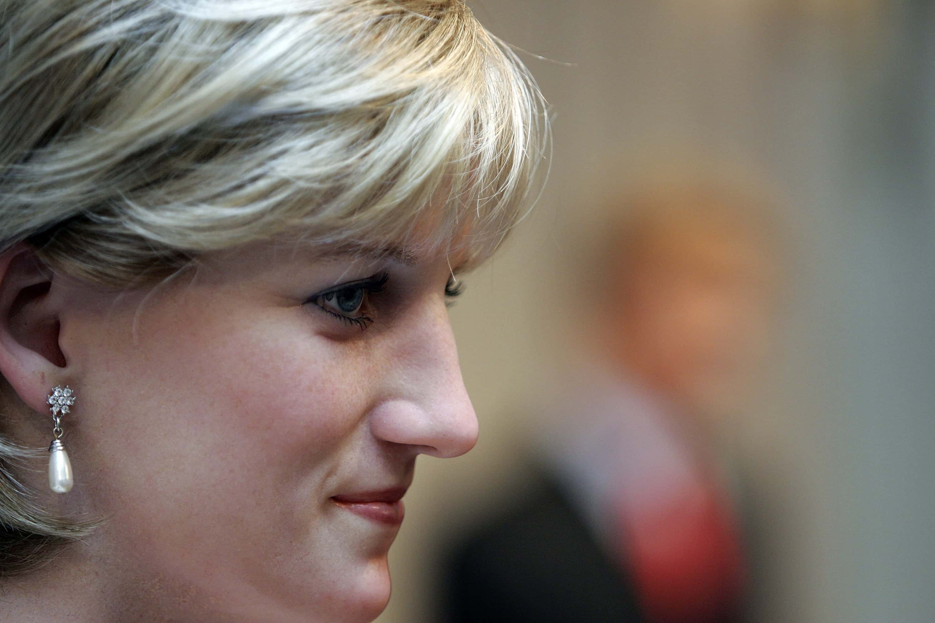 A wax figure of Princess Diana is seen during the official Madame Tussauds' wax effigy of HRH Prince William is unveiled at London's Marylebone Road tourist attraction on August 3, 2005 in London, England.  Guests can indulge in a day of regal fantasy fun, taking to the red carpet for a Cinderella Slipper Test for the chance to claim a kiss from a modern day Prince Charming.