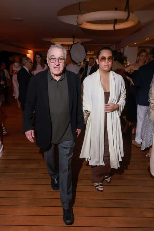 Robert De Niro and Tiffany Chen attends the Cannes Film Festival Air Mail /Warner Brothers Discovery Party at Hotel du Cap-Eden-Roc on May 23, 2023 in Cap d'Antibes, France.