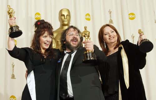 (HOLLYWOOD REPORTER AND US TABS OUT)  Writers Fran Walsh, Peter Jackson and Philippa Boyens pose with their Oscar for Best Adapted Screenplay for