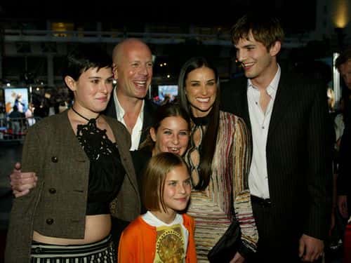 Actor Bruce Willis (L), actress Demi Moore and actor Ashton Kutcher with Demi and Bruce's kids Rumour (L), Scout  (C) and Tallulah Belle attend the premiere of Columbia Pictures' film