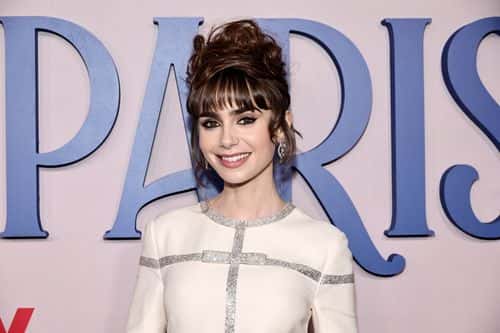 Lily Collins attends the Emily In Paris French Consulate Red Carpet at French Consulate on December 15, 2022 in New York City.