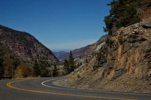 Million Dollar Highway spans from Silverton to Ouray, Colorado along the San Juan Mountains