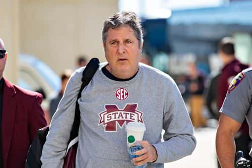 Head Coach Mike Leach of the Mississippi State Bulldogs arrives at the stadium before a game against the Arkansas Razorbacks at Donald W. Reynolds Razorback Stadium on November 06, 2021 in Fayetteville, Arkansas.