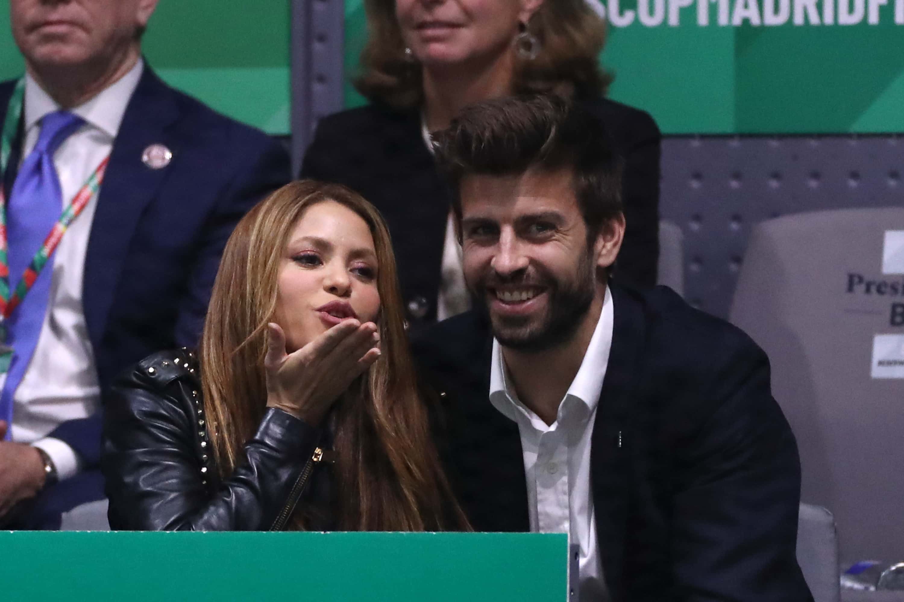 Singer Shakira (L) and her husband and footballer Gerard Pique of FC Barcelona (R) react in the stands as they watch the singles final match between Rafael Nadal of Spain and Denis Shapovalov of Canada during Day Seven of the 2019 Davis Cup at La Caja Magica on November 24, 2019 in Madrid, Spain.