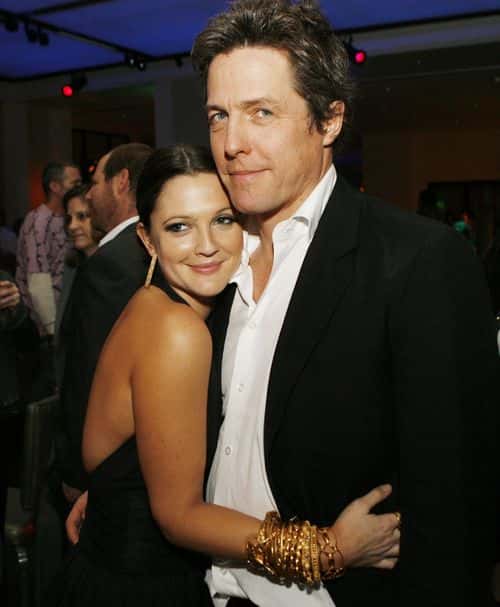 Actors Drew Barrymore and Hugh Grant pose at the afterparty for the premiere of Warner Bros. Picture's