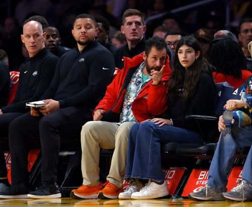 Adam Sandler and Sunny Sandler attend a game between the Atlanta Hawks and the Los Angeles Lakers in the first half at Crypto.com Arena on January 06, 2023 in Los Angeles, California.  NOTE TO USER: User expressly acknowledges and agrees that, by downloading and/or using this photograph, user is consenting to the terms and conditions of the Getty Images License Agreement.
