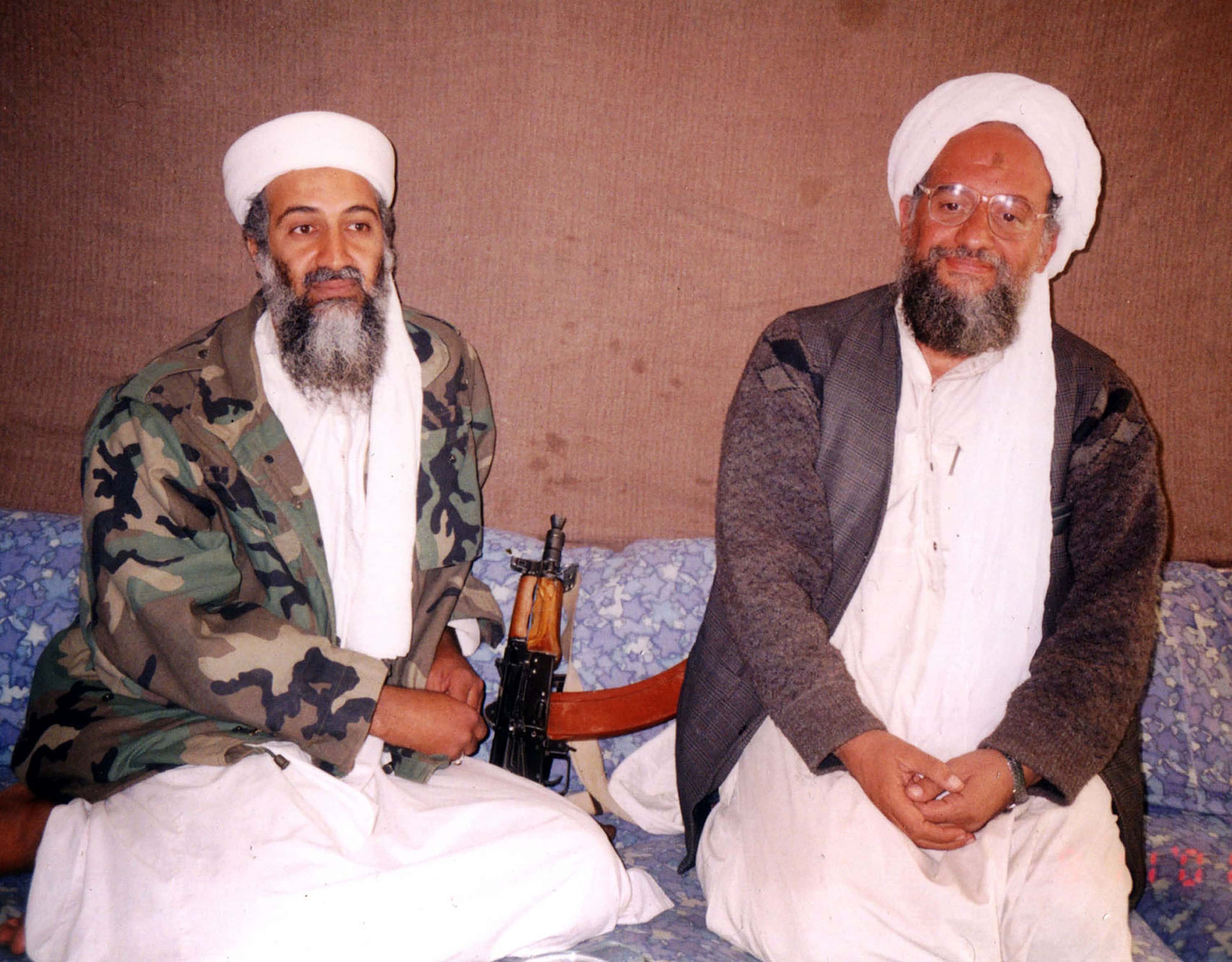 UNDATED PHOTO Osama bin Laden (L) sits with his adviser Ayman al-Zawahiri, an Egyptian linked to the al Qaeda network, during an interview with Pakistani journalist Hamid Mir at an undisclosed location in Afghanistan. In the article, which was published November 10, 2001 in Karachi, bin Laden said he had nuclear and chemical weapons and might use them in response to U.S. attacks.