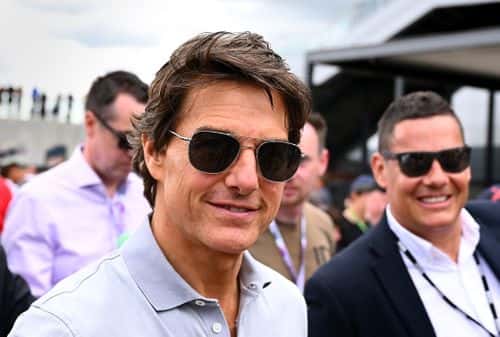 Actor Tom Cruise walks in the Paddock prior to the F1 Grand Prix of Great Britain at Silverstone on July 03, 2022 in Northampton, England.