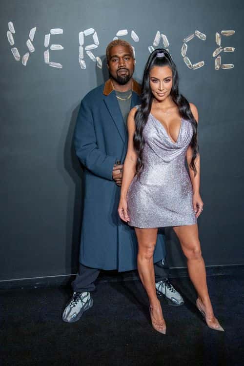 Kanye West and Kim Kardashian West attend the the Versace fall 2019 fashion show at the American Stock Exchange Building in lower Manhattan on December 02, 2018 in New York City.