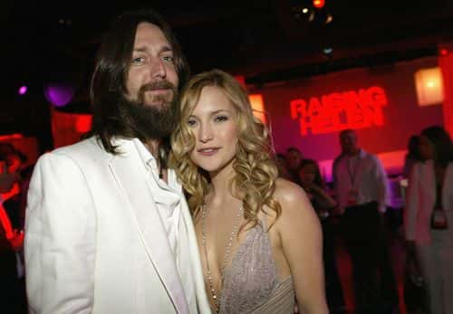 (US TABS AND HOLLYWOOD REPORTER OUT) Actress Kate Hudson and husband, musician Chris Robinson, pose as they attend the film premiere after party for the romantic comedy