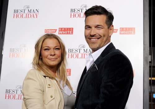 Singer Leann Rimes (L) and her husband actor Eddie Cibrian arrive at the premiere of Universal Pictures'