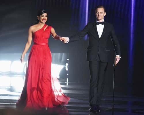Actors Priyanka Chopra and Tom Hiddleston walk onstage during the 68th Annual Primetime Emmy Awards at Microsoft Theater on September 18, 2016 in Los Angeles, California.