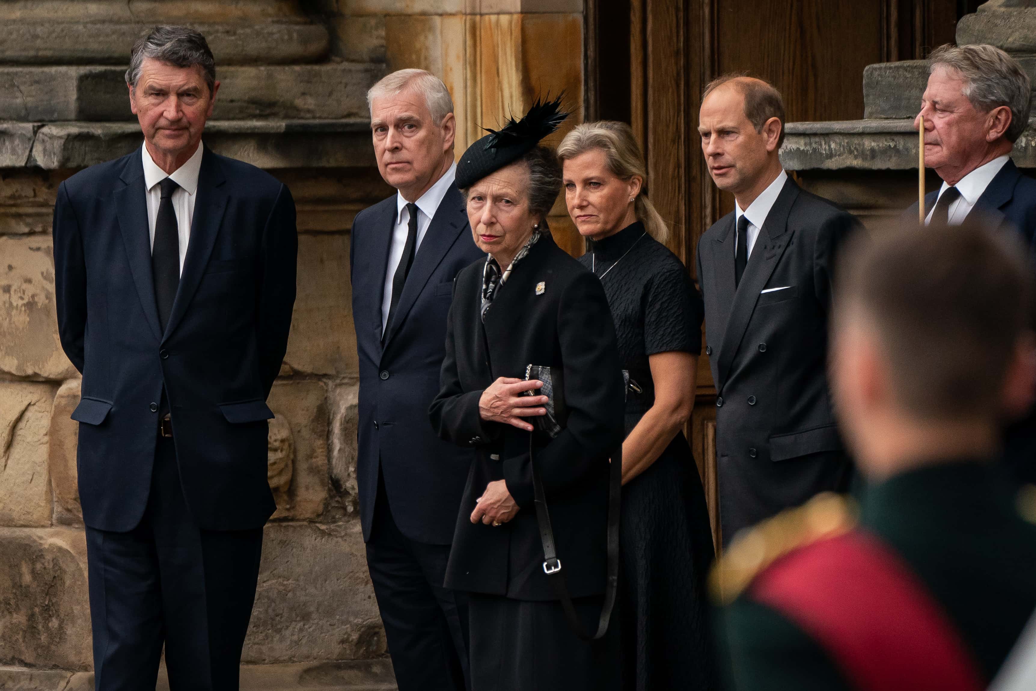 (L-R) Vice Admiral Timothy Laurence, Britain's Prince Andrew, Duke of York, Britain's Princess Anne, Princess Royal, Britain's Sophie, Countess of Wessex and Britain's Prince Edward, Earl of Wessex watch as the coffin of Queen Elizabeth II, draped with the Royal Standard of Scotland, completes its journey from Balmoral to the Palace of Holyroodhouse on September 11, 2022 in Edinburgh, United Kingdom. Elizabeth Alexandra Mary Windsor was born in Bruton Street, Mayfair, London on 21 April 1926. She married Prince Philip in 1947 and ascended the throne of the United Kingdom and Commonwealth on 6 February 1952 after the death of her Father, King George VI. Queen Elizabeth II died at Balmoral Castle in Scotland on September 8, 2022, and is succeeded by her eldest son, King Charles III.