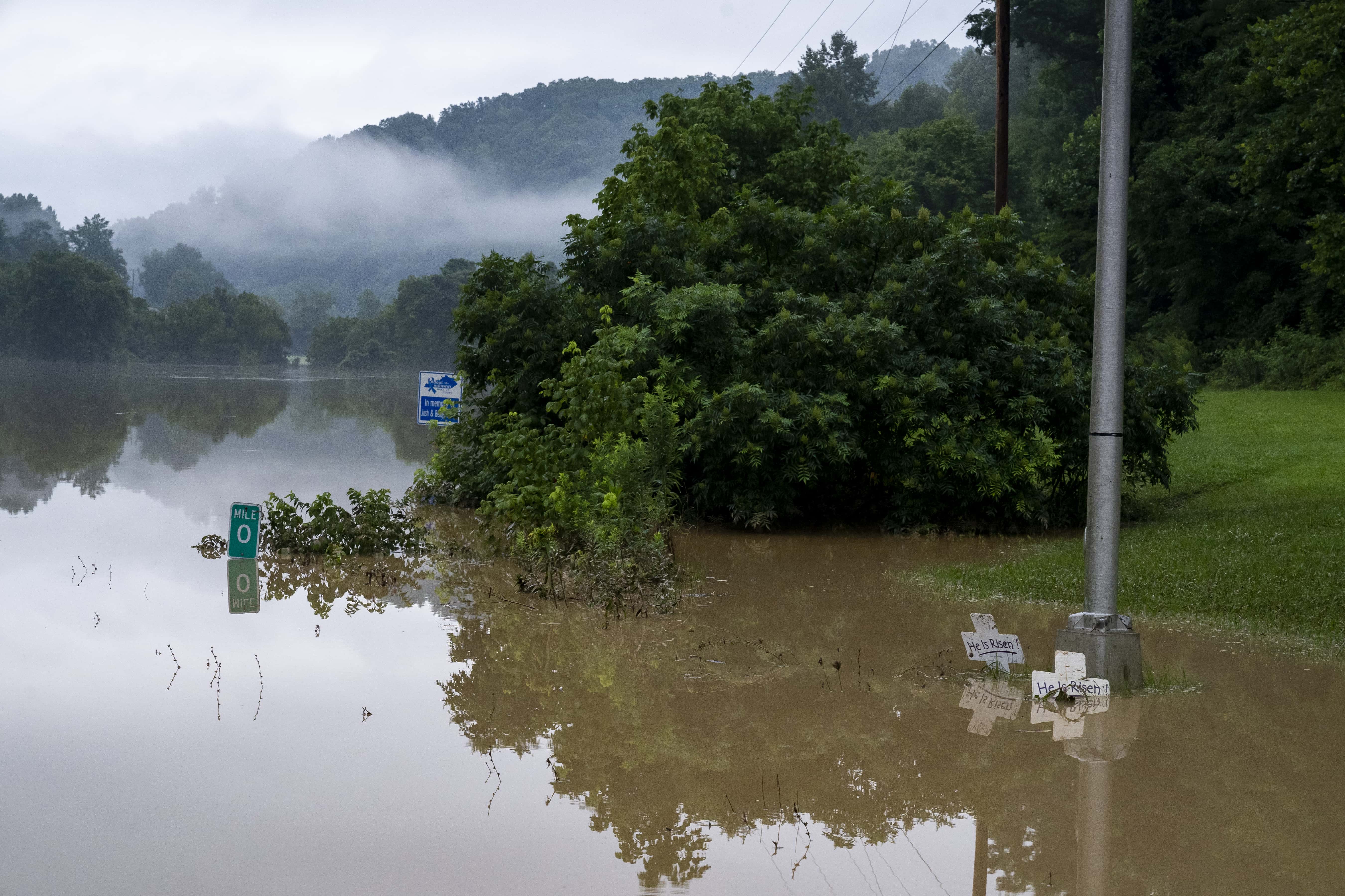 Flooding from the North Fork of the Kentucky River came over Bert T Combs Mountain Parkway outside of Jackson, Kentucky on July 29, 2022 in Breathitt County, Kentucky. At least 16 people have been killed and hundreds had to be rescued amid flooding from heavy rainfall.