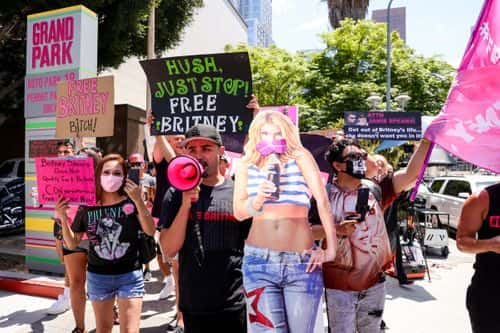 #FreeBritney activists protest at Los Angeles Grand Park during a conservatorship hearing for Britney Spears on June 23, 2021 in Los Angeles, California. Spears is expected to address the court remotely. Spears was placed in a conservatorship managed by her father, Jamie Spears, and an attorney, which controls her assets and business dealings, following her involuntary hospitalization for mental care in 2008.