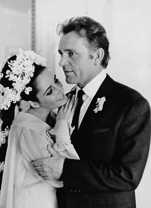 15th March 1964: British film stars Elizabeth Taylor (1932 - 2011) and Richard Burton (1925 - 1984) 