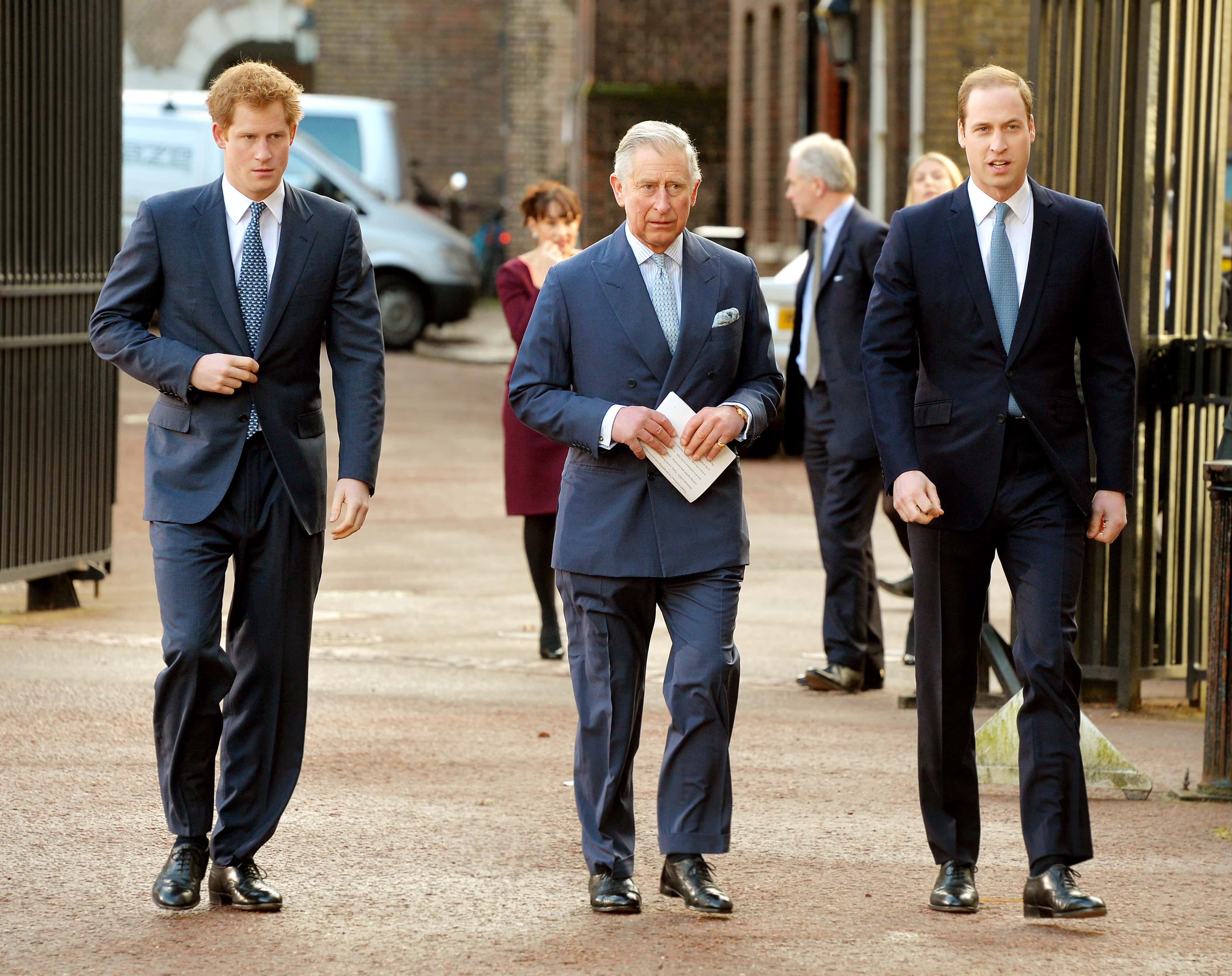 (L-R) Prince Harry, Prince Charles, Prince of Wales and Prince William, Duke of Cambridge arrive at the Illegal Wildlife Trade Conference at Lancaster House on February 13, 2014 in London, England. It is hoped that following discussions at the conference, nations will sign a declaration that will commit them to a range of goals to combat the poaching that is threatening animals such as tigers, elephants and rhinos.