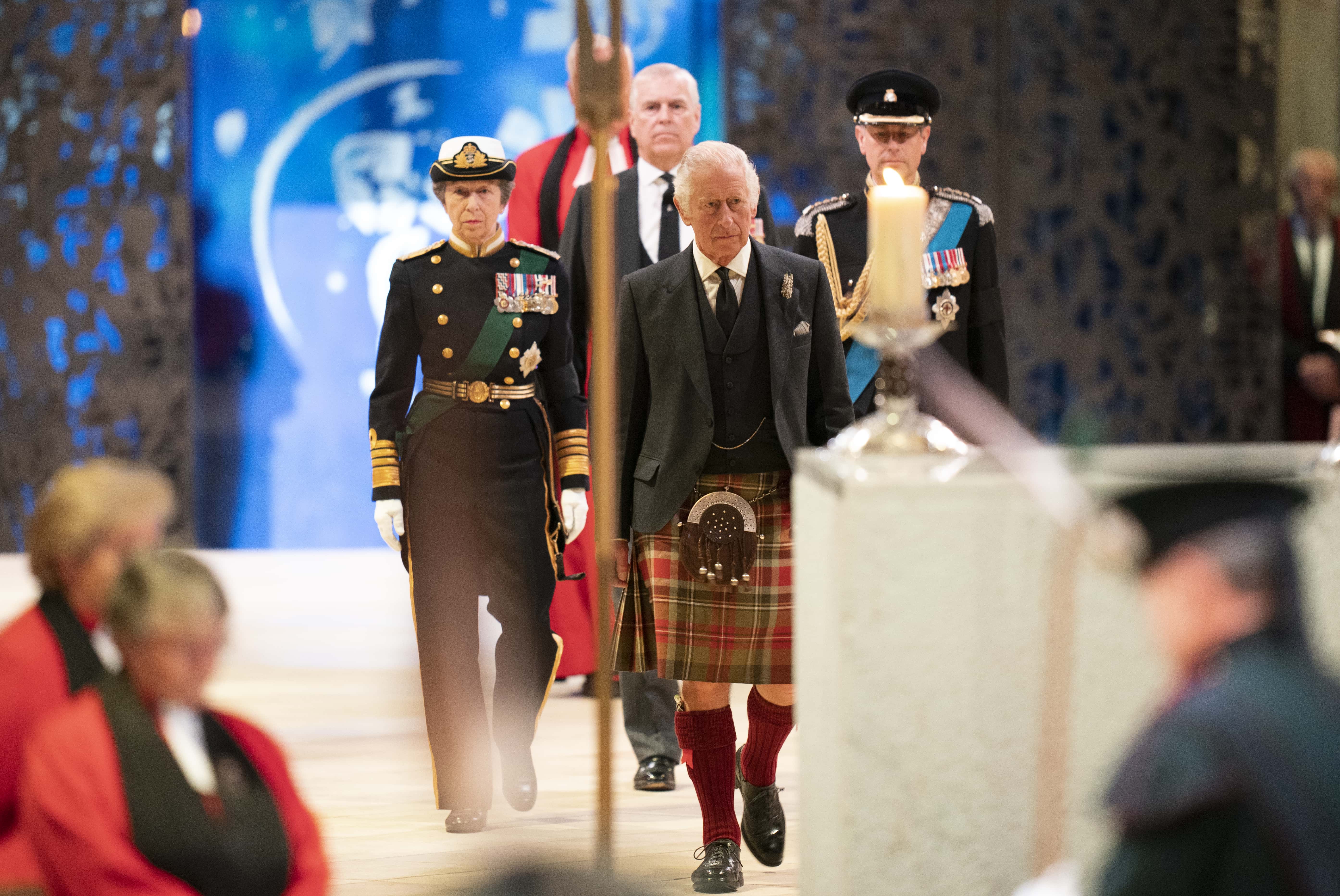 King Charles III, Prince Edward, Duke of Wessex, Princess Anne, Princes Royal and Prince Andrew, Duke of York arrive to hold a vigil at St Giles' Cathedral, in honour of Queen Elizabeth II as members of the public walk past on September 12, 2022 in Edinburgh, Scotland. The Queen’s four children attend to stand vigil over her coffin where it lies in rest for 24 hours before being transferred by air to London.