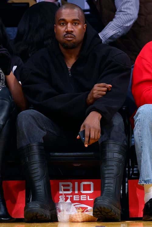 Rapper Kanye West attends a game between the Washington Wizards and the Los Angeles Lakers in the fourth quarter at Crypto.com Arena on March 11, 2022 in Los Angeles, California.  NOTE TO USER: User expressly acknowledges and agrees that, by downloading and/or using this Photograph, user is consenting to the terms and conditions of the Getty Images License Agreement.
