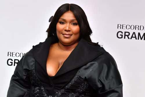 Lizzo poses during Reel To Reel: LOVE, LIZZO at The GRAMMY Museum on December 14, 2022 in Los Angeles, California.