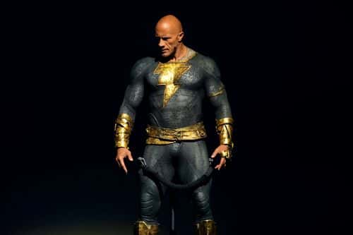 Dwayne Johnson speaks onstage at the Warner Bros. theatrical session with