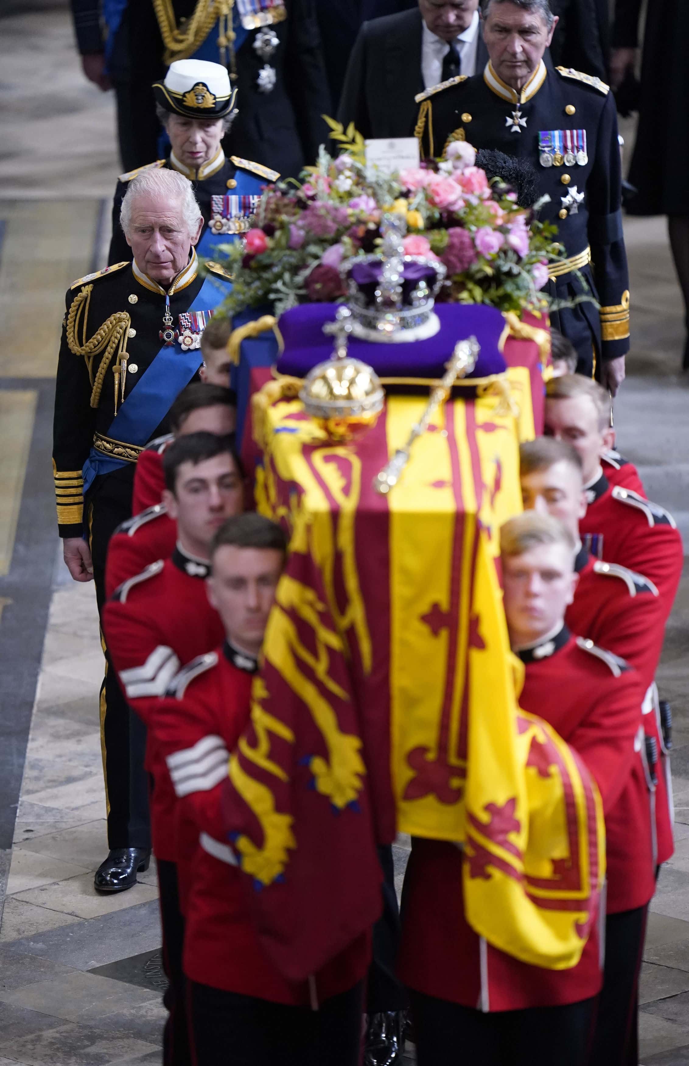 King Charles III, the Queen Consort, the Princess Royal, Vice Admiral Sir Tim Laurence, the Duke of York, the Earl of Wessex, the Countess of Wessex, the Prince of Wales, the Princess of Wales, Prince George, Princess Charlotte, the Duke of Sussex, the Duchess of Sussex, Peter Phillips and the Earl of Snowdon follow behind the coffin of Queen Elizabeth II, draped in the Royal Standard with the Imperial State Crown and the Sovereign's orb and sceptre, as it is carried out of Westminster Abbey after her State Funeralon September 19, 2022 in London, England. Elizabeth Alexandra Mary Windsor was born in Bruton Street, Mayfair, London on 21 April 1926. She married Prince Philip in 1947 and ascended the throne of the United Kingdom and Commonwealth on 6 February 1952 after the death of her Father, King George VI. Queen Elizabeth II died at Balmoral Castle in Scotland on September 8, 2022, and is succeeded by her eldest son, King Charles III.