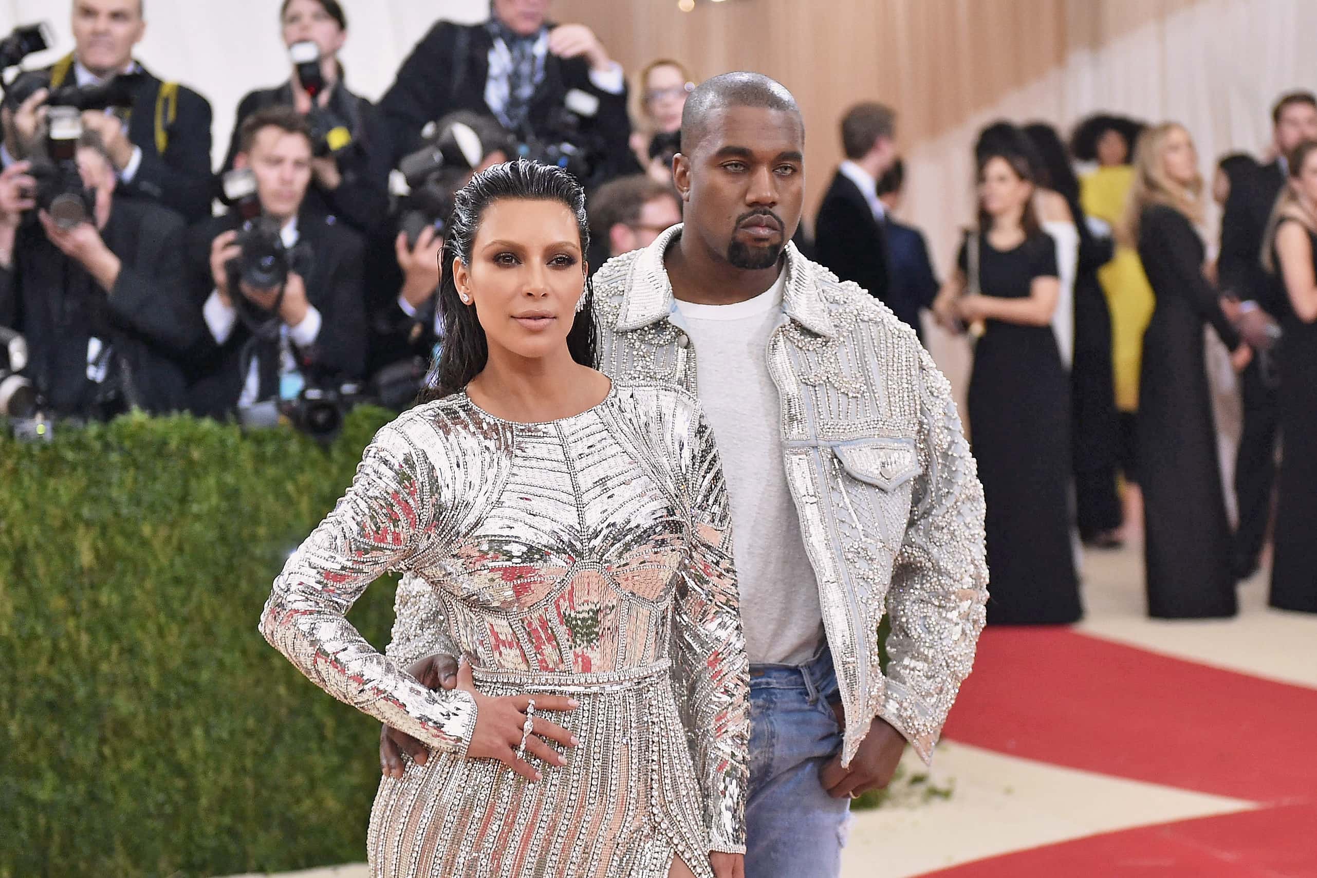 Kim Kardashian (L) and Kanye West attend the 