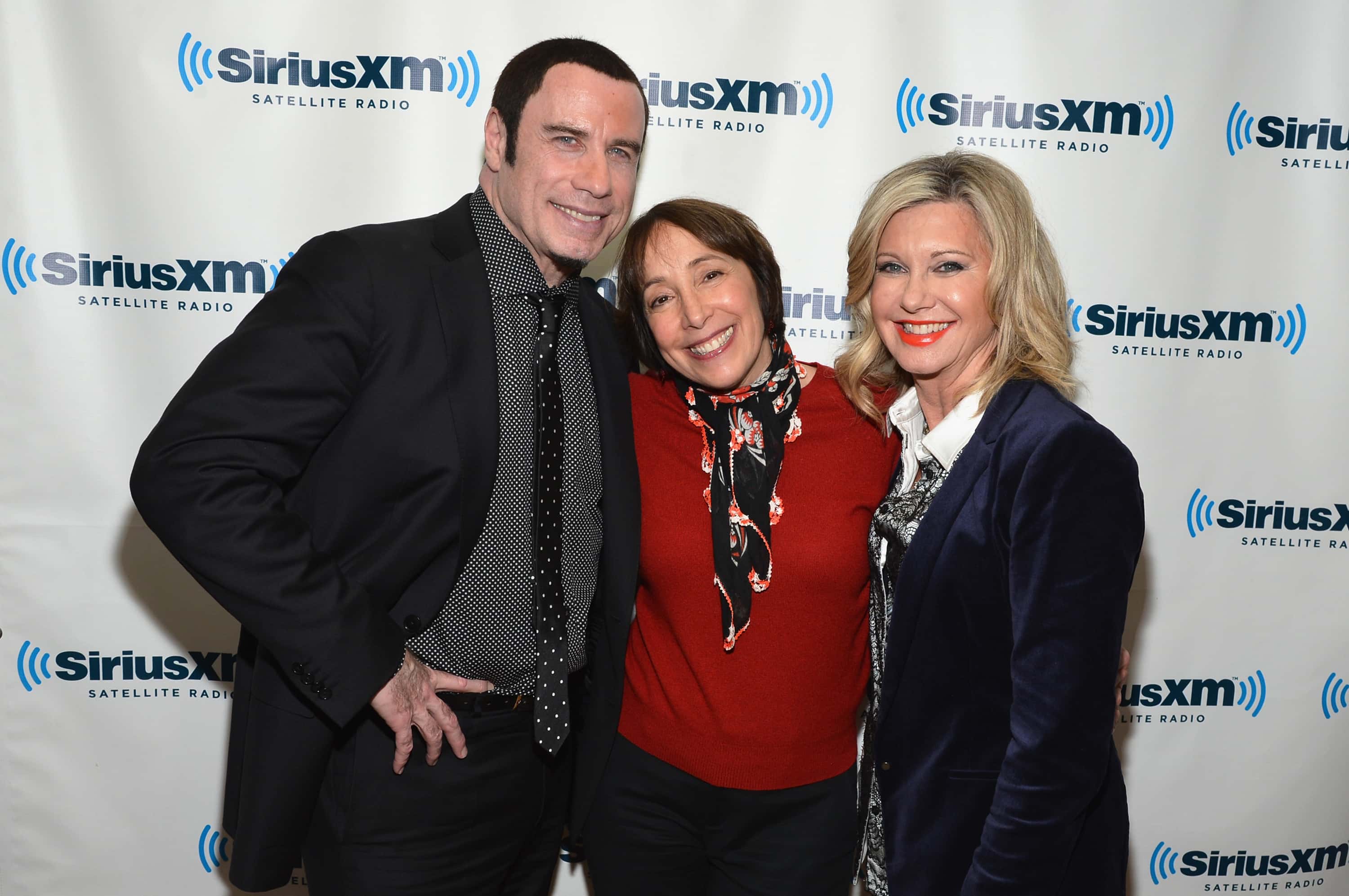 John Travolta, Didi Conn and Olivia Newton-John attend SiriusXM's Town Hall with John Travolta and Olivia Newton-John hosted by Didi Conn at the SiriusXM studios on December 12, 2012 in New York City.