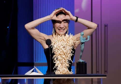 Michelle Yeoh accepts the Outstanding Performance by a Female Actor in a Leading Role for