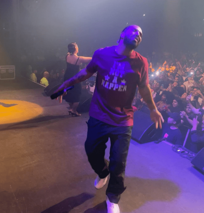Drake performing with Nelly Furtado (Photo by Instagram@champagnepapi)