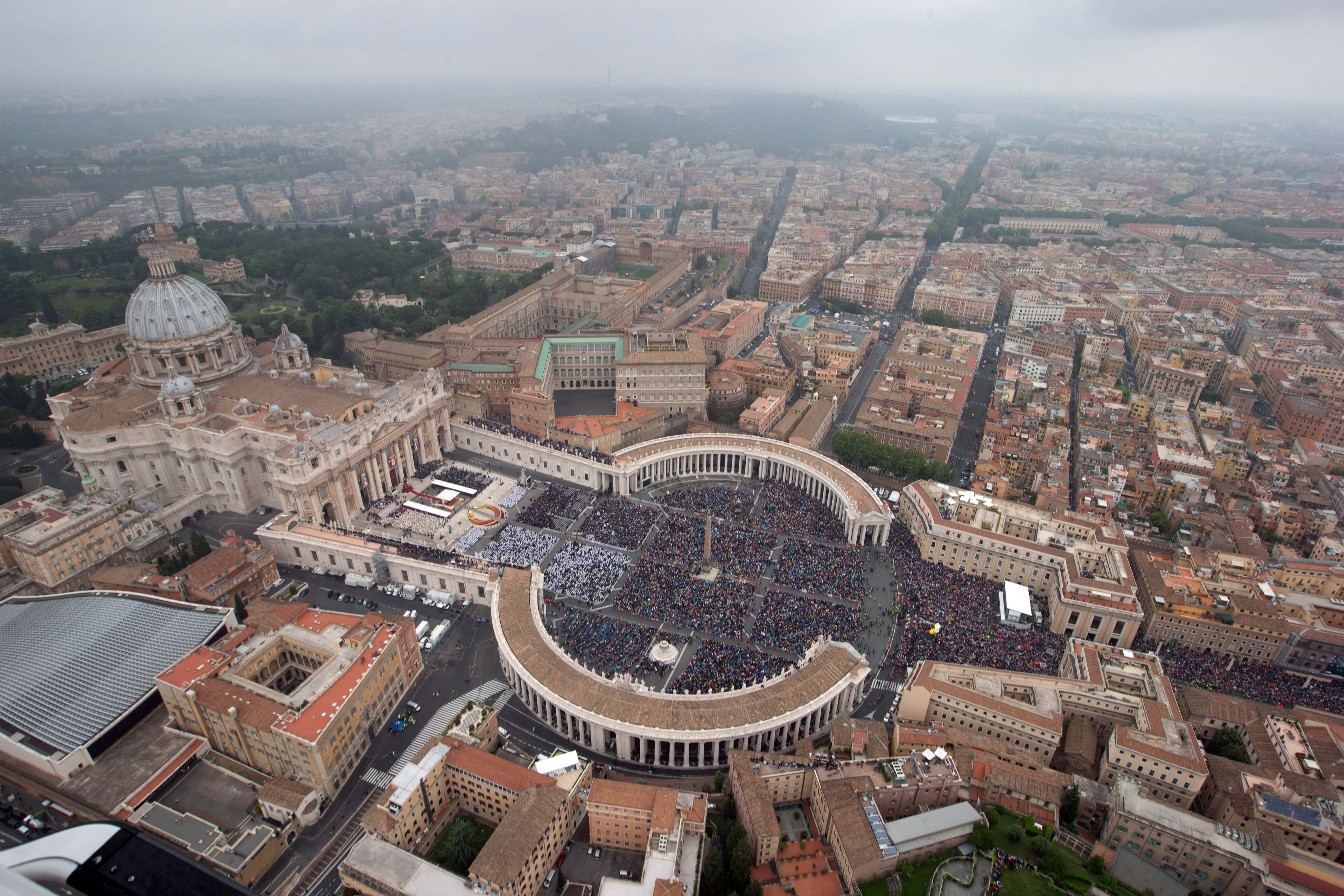 In this handout photo provided by the Italian National Police, an aerial view of St. Peter's Square and Via della Conciliazione is seen as Pope Francis leads a Canonization Mass in which John Paul II and John XXIII are to be declared saints on April 27, 2014 in Vatican City, Vatican. Dignitaries, heads of state and Royals from around the world attended the canonisations in the Vatican today.
