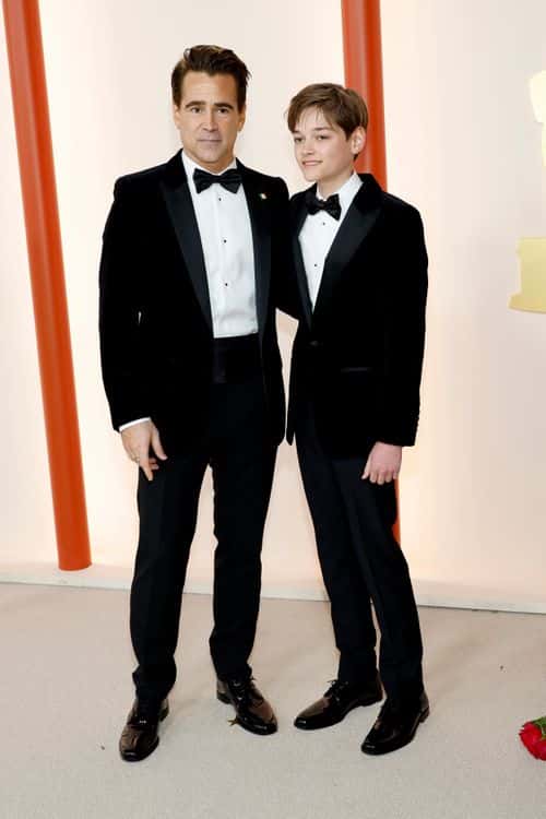 (L-R) Colin Farrell and Henry Tadeusz attend the 95th Annual Academy Awards on March 12, 2023 in Hollywood, California.