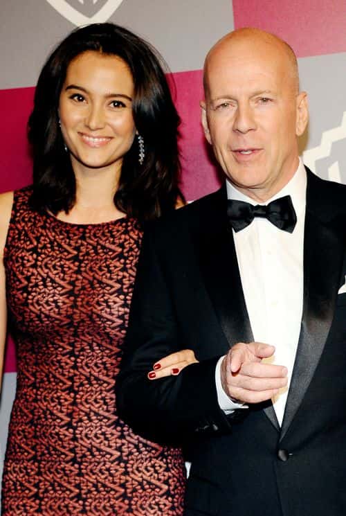Actor Bruce Willis (R) and Emma Heming arrives at the 2011 InStyle And Warner Bros. 68th Annual Golden Globe Awards post-party held at The Beverly Hilton hotel on January 16, 2011 in Beverly Hills, California.