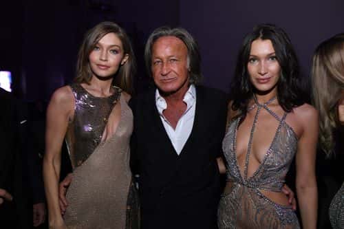 (L-R) Gigi Hadid, Mohamed Hadid and Bella Hadid attend the Victoria's Secret After Party at the Grand Palais on November 30, 2016 in Paris, France.