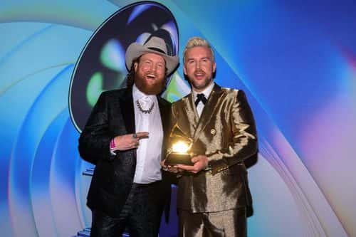 John Osborne and T.J. Osborne of Brothers Osborne, winners of the Best Country Duo/Group Performance award for Younger Me attend the 64th Annual GRAMMY Awards Premiere Ceremony at MGM Grand Marquee Ballroom on April 03, 2022 in Las Vegas, Nevada.