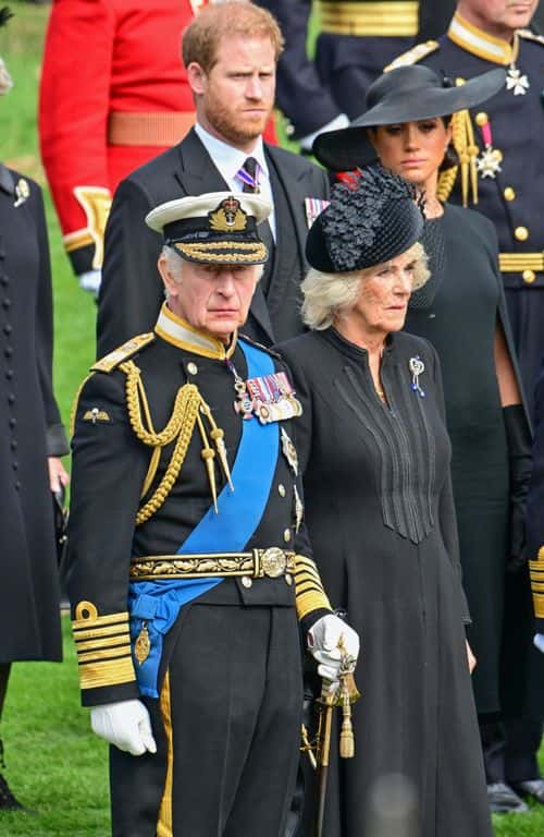 Prince Harry, Duke of Sussex, Meghan, Duchess of Sussex, King Charles III and Camilla, Queen Consort observe the coffin of Queen Elizabeth II as it is transferred from the gun carriage to the hearse at Wellington Arch following the State Funeral of Queen Elizabeth II at Westminster Abbey on September 19, 2022 in London, England. Elizabeth Alexandra Mary Windsor was born in Bruton Street, Mayfair, London on 21 April 1926. She married Prince Philip in 1947 and ascended the throne of the United Kingdom and Commonwealth on 6 February 1952 after the death of her Father, King George VI. Queen Elizabeth II died at Balmoral Castle in Scotland on September 8, 2022, and is succeeded by her eldest son, King Charles III.
