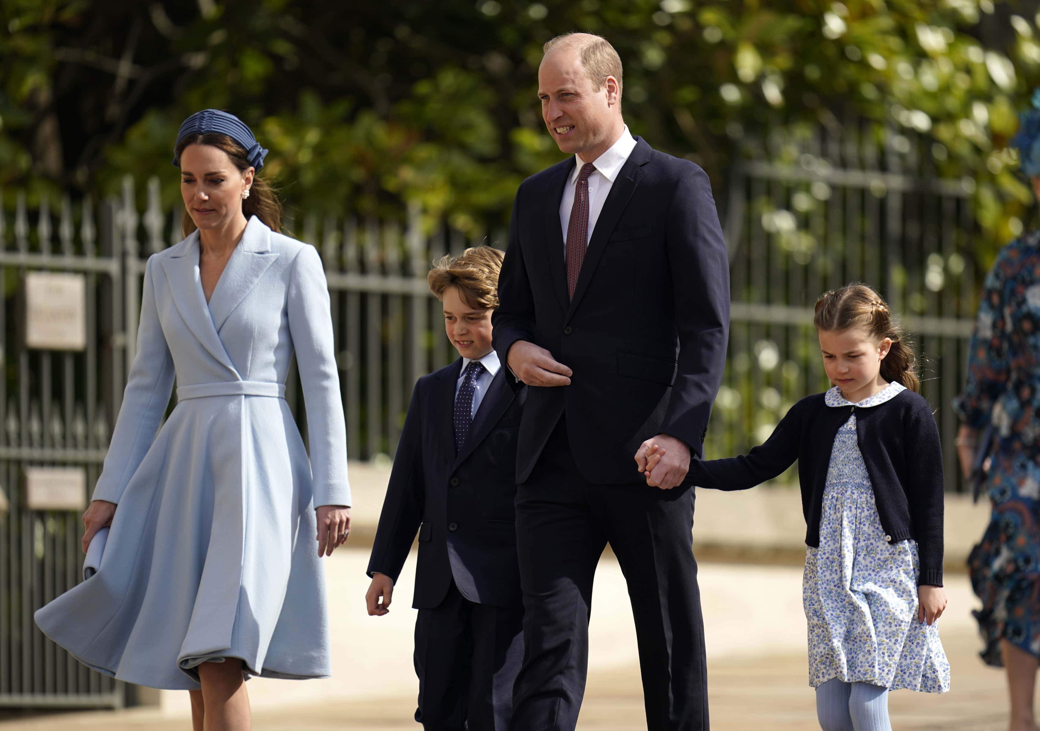 Prince William, Duke of Cambridge, Catherine, Duchess of Cambridge, Prince George and Princess Charlotte attend the Easter Matins Service at St George's Chapel at Windsor Castle on April 17, 2022 in Windsor, England.