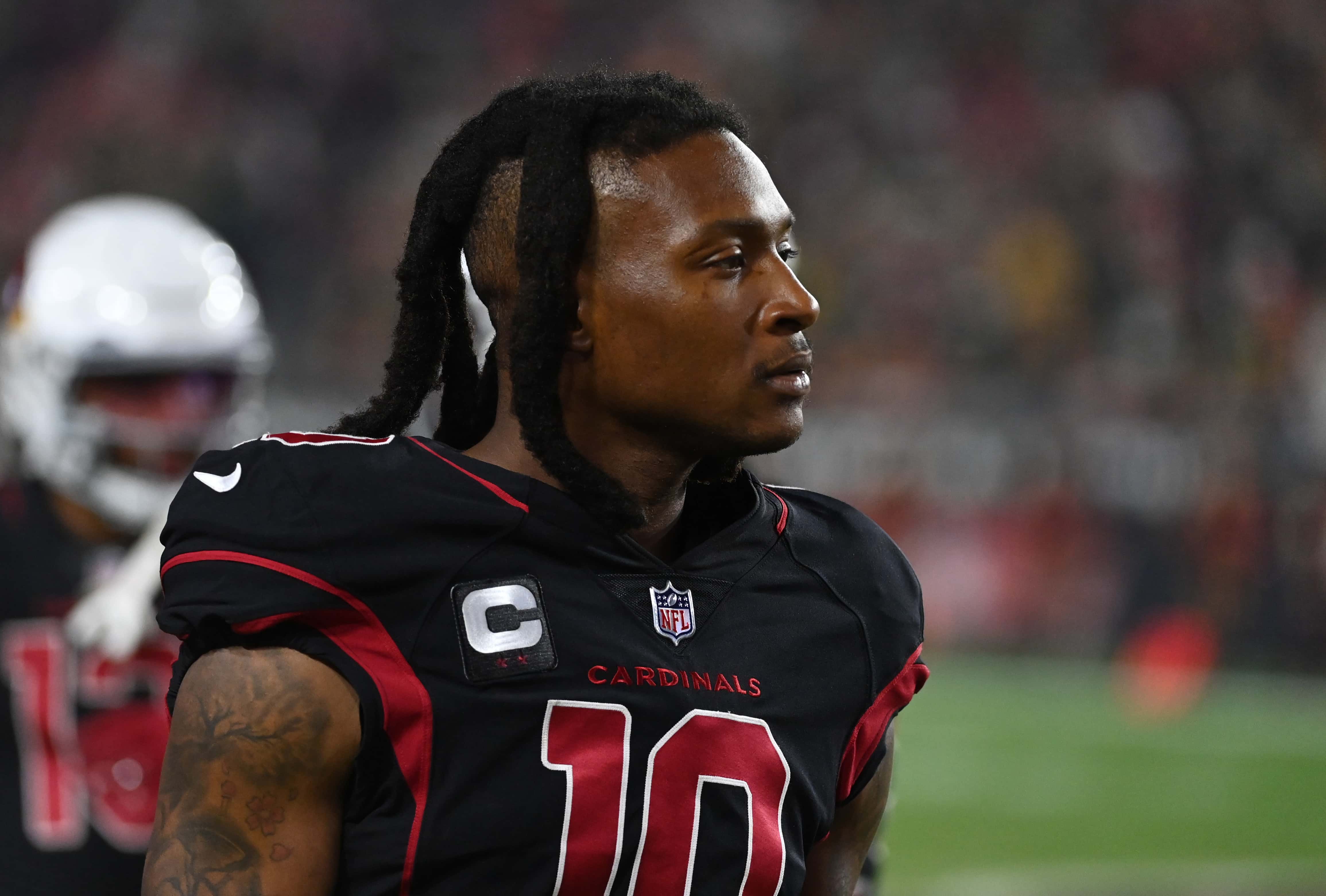 DeAndre Hopkins #10 of the Arizona Cardinals looks on from the sidelines against the Green Bay Packers at State Farm Stadium on October 28, 2021 in Glendale, Arizona. Green Bay won 24-21.