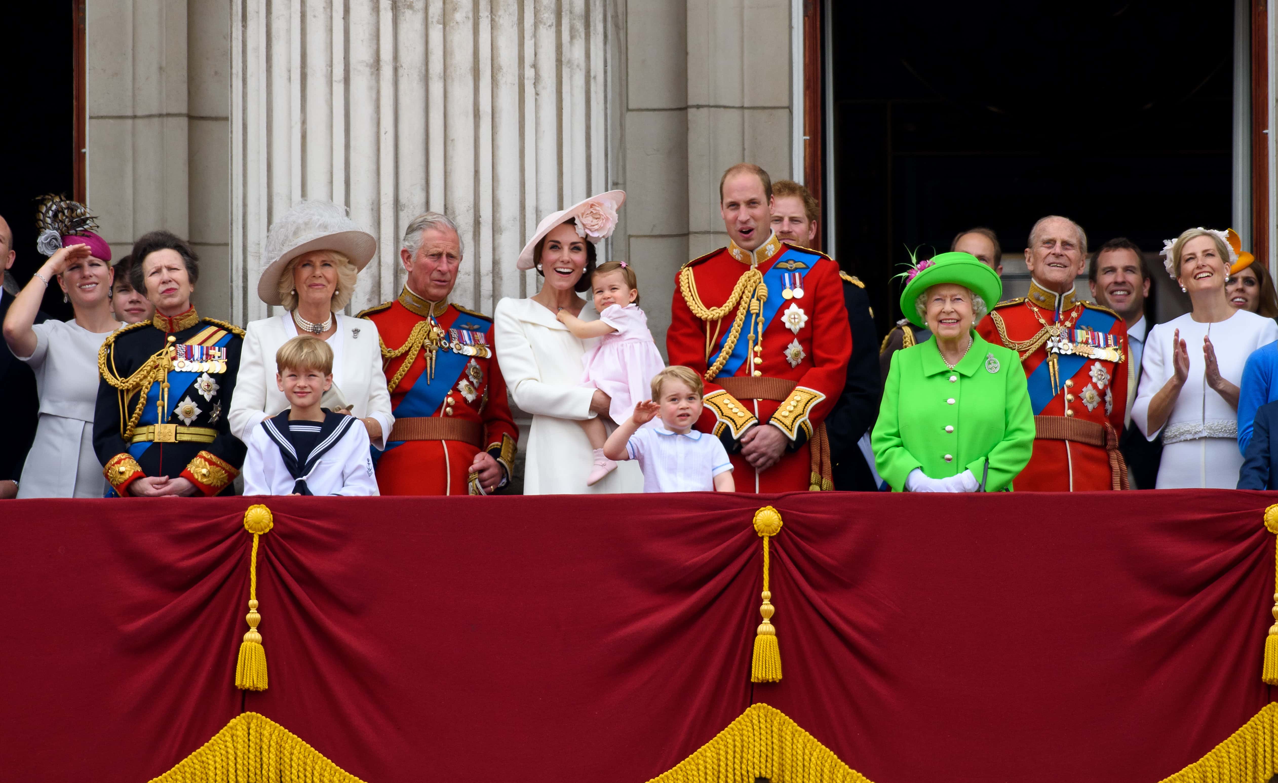 (L-R) Zara Tindall, Anne, Princess Royal, Camilla, Duchess of Cornwall, Charles, Prince of Wales, Catherine, Duchess of Cambridge, Princess Charlotte of Cambridge, Prince George of Cambridge, Prince William, Duke of Cambridge, Prince Harry, Queen Elizabeth II  Prince Philip, Duke of Edinburgh and Sophie, Countess of Wessex watch a fly past during the Trooping the Colour, this year marking the Queen's 90th birthday at The Mall on June 11, 2016 in London, England. The ceremony is Queen Elizabeth II's annual birthday parade and dates back to the time of Charles II in the 17th Century when the Colours of a regiment were used as a rallying point in battle.