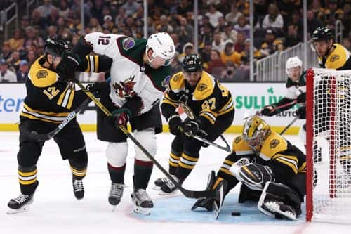 Jeremy Swayman #1 of the Boston Bruins saves a shot from Nick Ritchie #12 of the Arizona Coyotes  during the second period at TD Garden on October 15, 2022 in Boston, Massachusetts.
