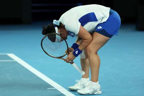 Ons Jabeur of Tunisia reacts in their round two singles match against Marketa Vondrousova of the Czech Republic day four of the 2023 Australian Open at Melbourne Park on January 19, 2023 in Melbourne, Australia.