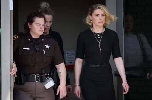 Actress Amber Heard (R) departs the Fairfax County Courthouse on June 1, 2022 in Fairfax, Virginia. The jury in the Depp vs. Heard case awarded actor Johnny Depp $15 million in his defamation case against Heard.