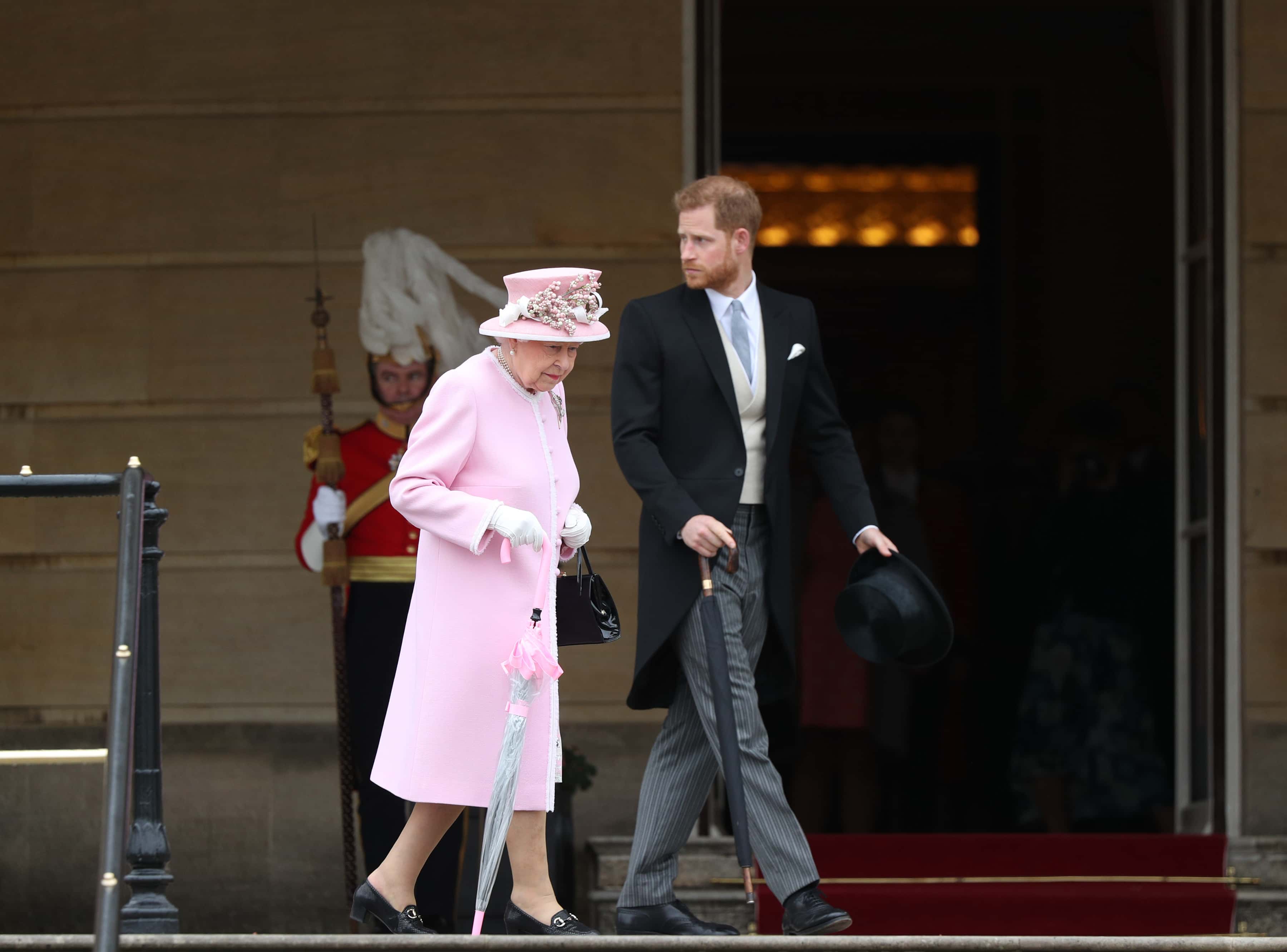 Queen Elizabeth II and Prince Harry, Duke of Sussex attend the Royal Garden Party at Buckingham Palace on May 29, 2019 in London, England.