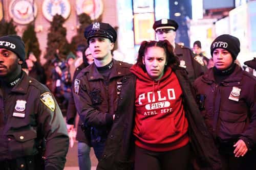 NYPD officers arrest a demonstrator as people protest the death of Tyre Nichols on January 27, 2023 in New York City. The release of a video depicting the fatal beating of Nichols, a 29-year-old Black man, sparked protests in NYC and other cities throughout the country. Nichols was violently beaten for three minutes and killed by Memphis police officers earlier this month after a traffic stop. Five Black Memphis Police officers have been fired after an internal investigation found them to be “directly responsible” for the beating and have been charged with “second-degree murder, aggravated assault, two charges of aggravated kidnapping, two charges of official misconduct and one charge of official oppression.”