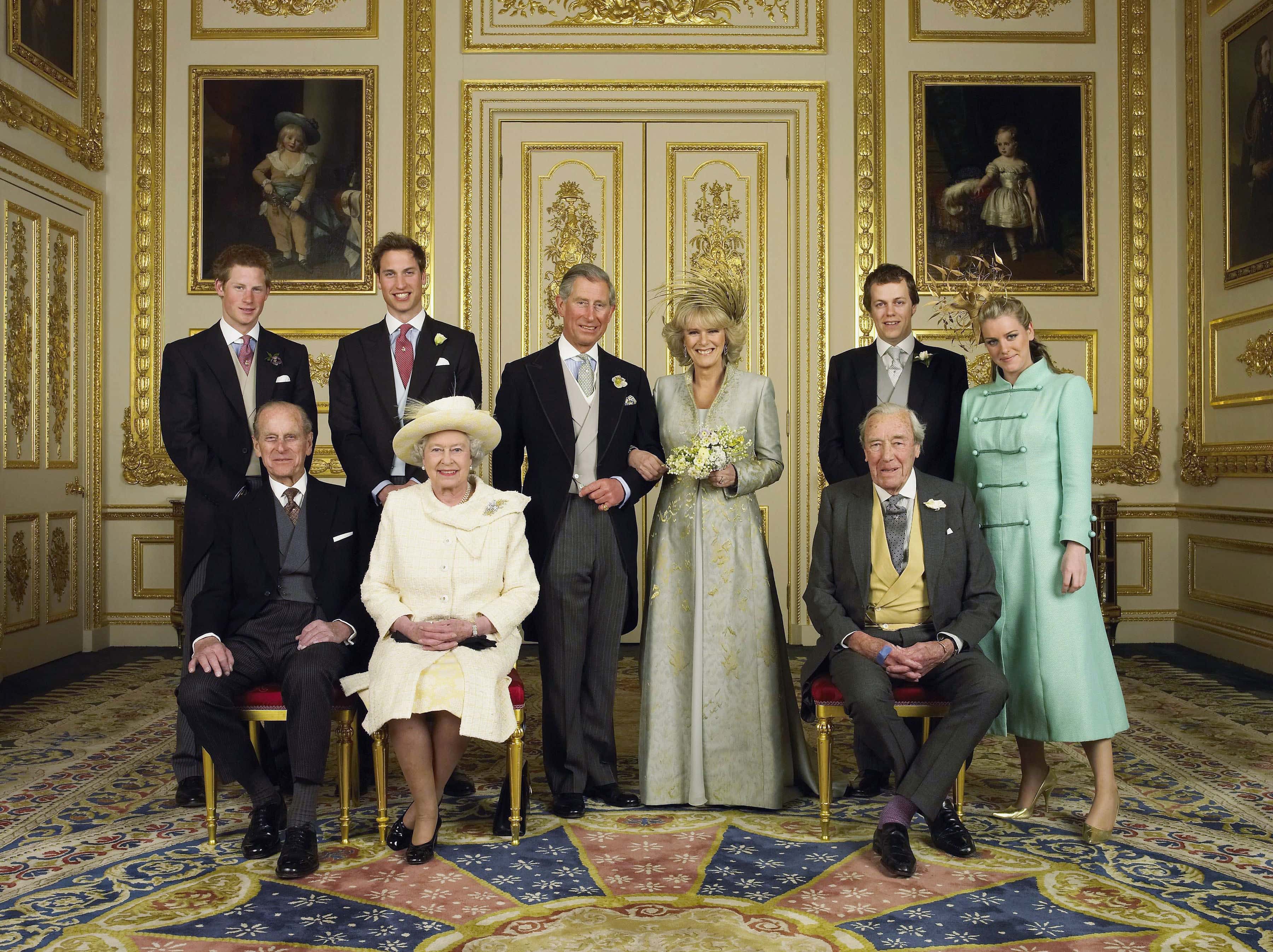 Clarence House official handout photo of the Prince of Wales and his new bride Camilla, Duchess of Cornwall, with their families (L-R back row) Prince Harry, Prince William, Tom and Laura Parker Bowles (L-R front row) Duke of Edinburgh, Britain's Queen Elizabeth II and Camilla's father Major Bruce Shand, in the White Drawing Room at Windsor Castle after their wedding ceremony, April 9, 2005 in Windsor, England.