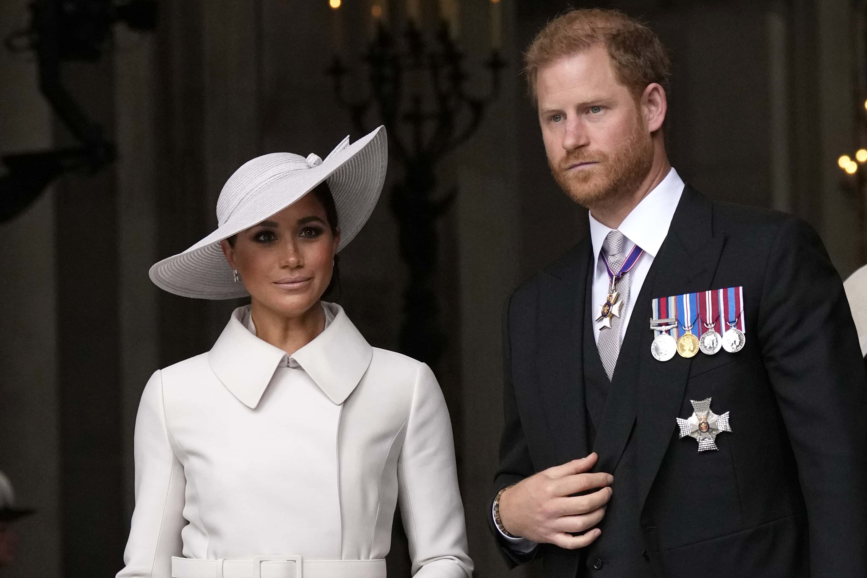 Prince Harry and Meghan Markle, Duke and Duchess of Sussex leave after a service of thanksgiving for the reign of Queen Elizabeth II at St Paul's Cathedral in London, Friday, June 3, 2022 on the second of four days of celebrations to mark the Platinum Jubilee. The events over a long holiday weekend in the U.K. are meant to celebrate the monarch's 70 years of service.