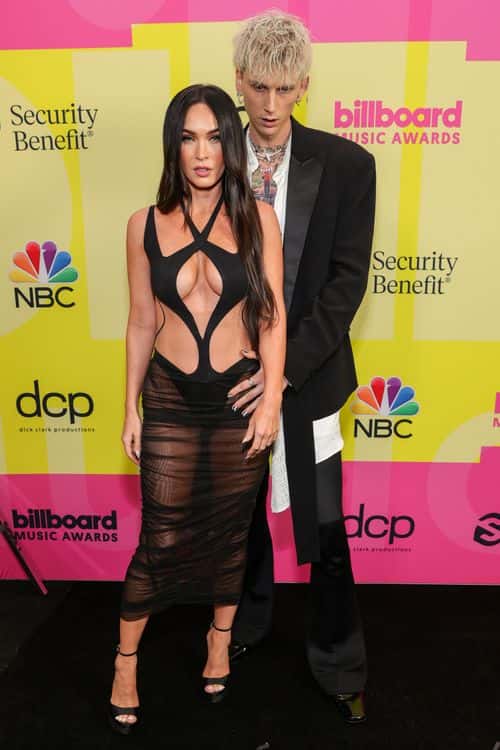 Megan Fox and Machine Gun Kelly poses backstage for the 2021 Billboard Music Awards, broadcast on May 23, 2021 at Microsoft Theater in Los Angeles, California.
