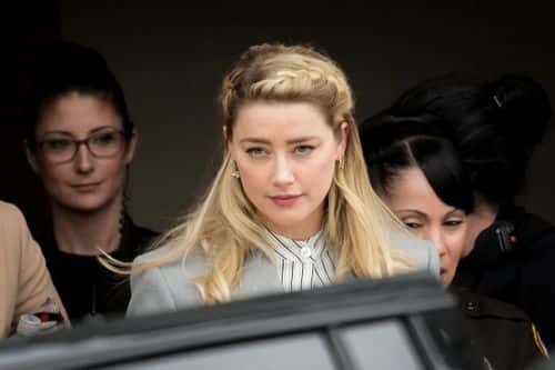 Actress Amber Heard departs the Fairfax County Courthouse on May 27, 2022 in Fairfax, Virginia. Closing arguments in the Depp v. Heard defamation trial, brought by Johnny Depp against his ex-wife Amber Heard, concluded today and jury deliberations begin.